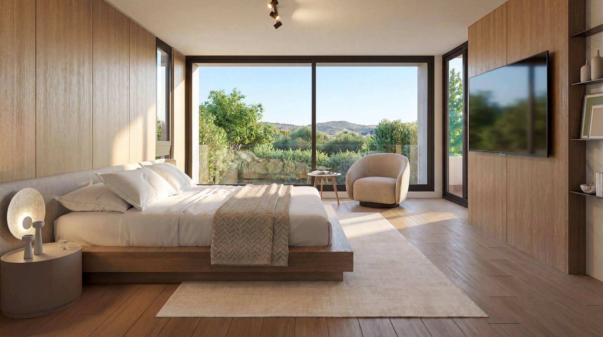 Dormitorio principal con luz natural y vista despejada al Club de Golf La Dehesa